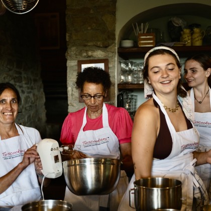 Tuscookany Italian cooking schools in Italy having fun at Torre del Tartufo