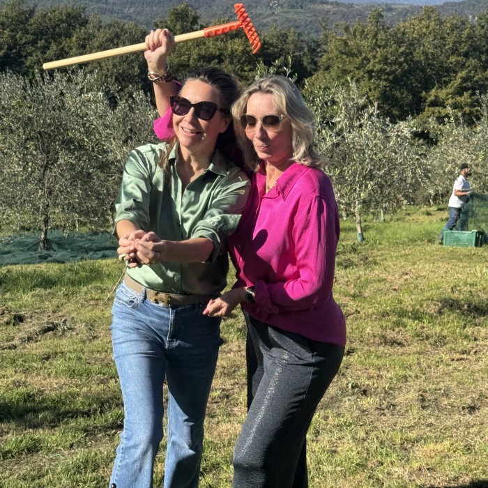 Having fun picking olives at Tuscookany